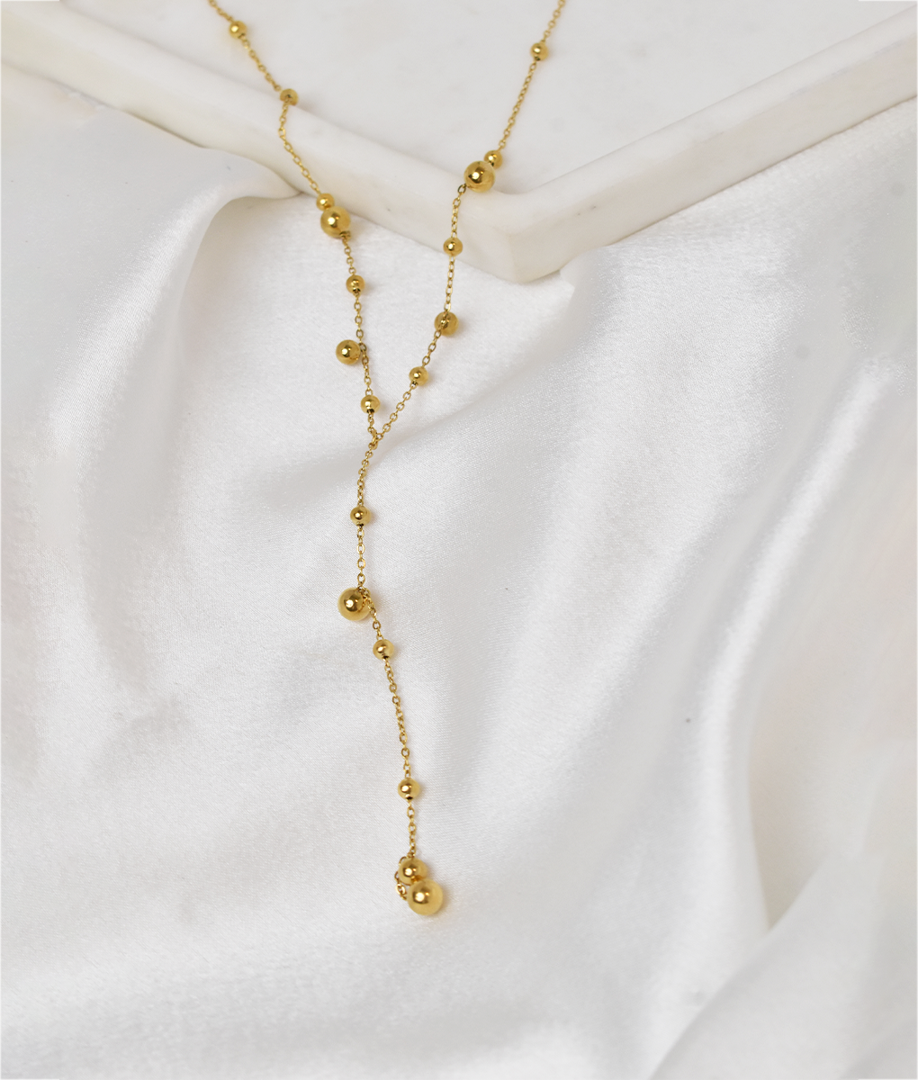 Gold bead drop necklace