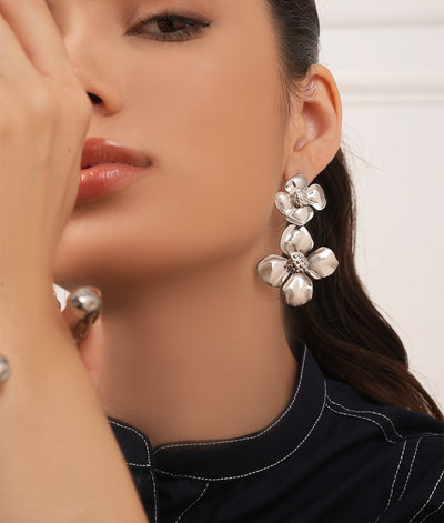 silver flower dangling earrings