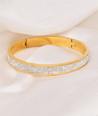 Gold bangle with cubic zirconia