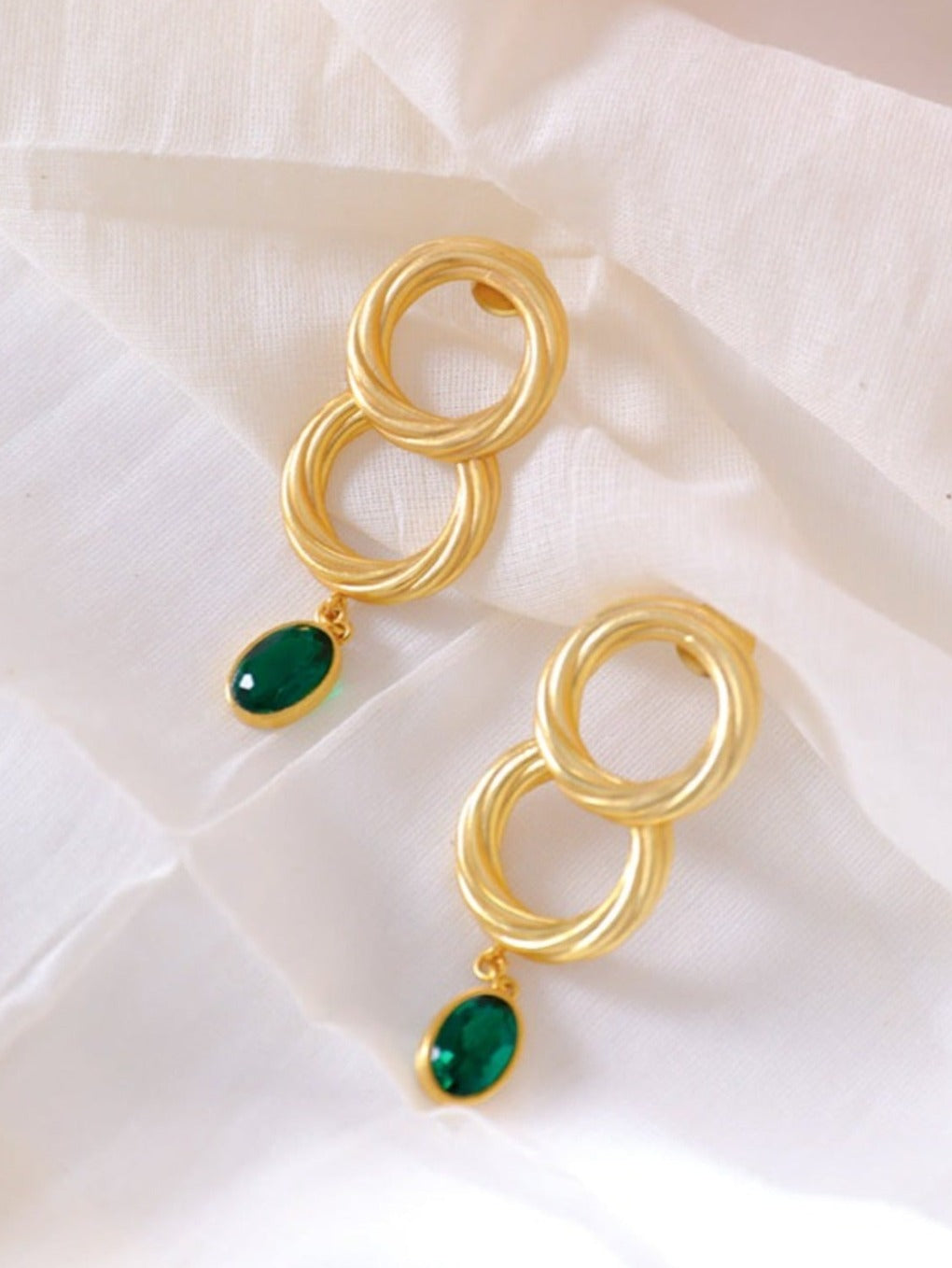 gold earrings with emerald drop