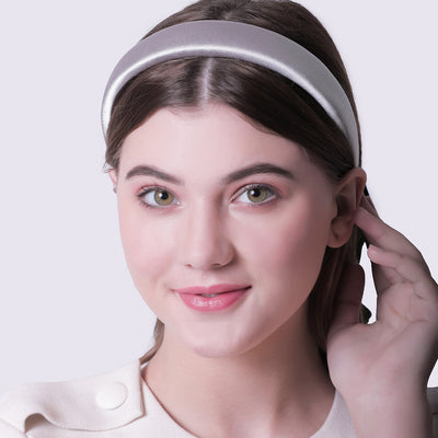 model wearing silver padded headband 